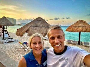 2024 Cancun, Donna & her husband on the beach