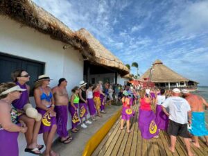 2024 Cancun XGOs group in purple pareos