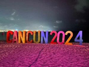 2024 Cancun sign on the beach at night